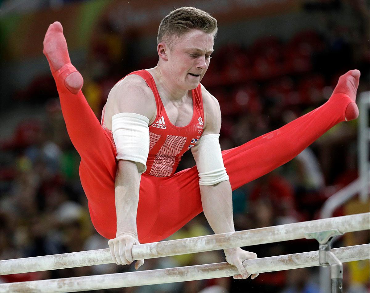 Photos Grace And Athleticism On Display As Gymnasts Go 