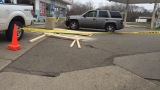 Car crashes into gas station, pinning clerk against wall